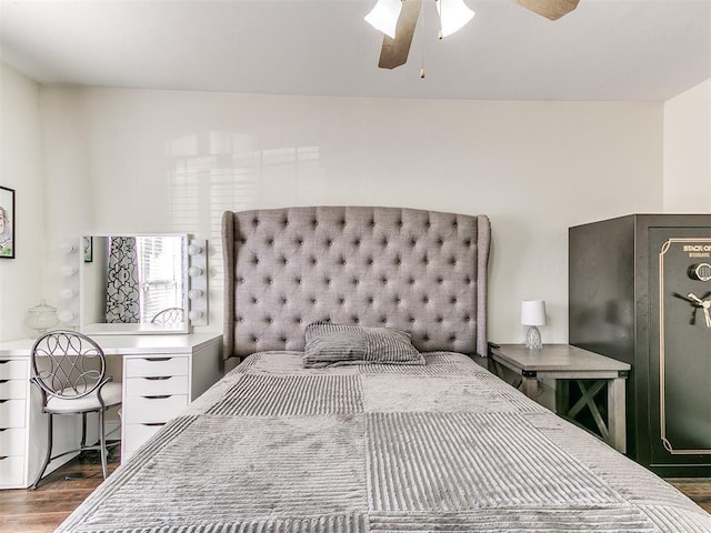 bedroom with ceiling fan and wood finished floors