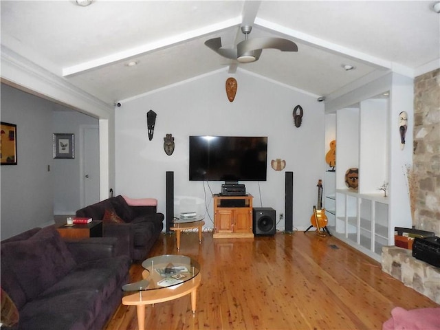 living room featuring lofted ceiling, hardwood / wood-style floors, and ceiling fan