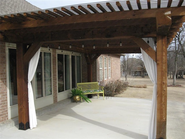 view of patio featuring a pergola