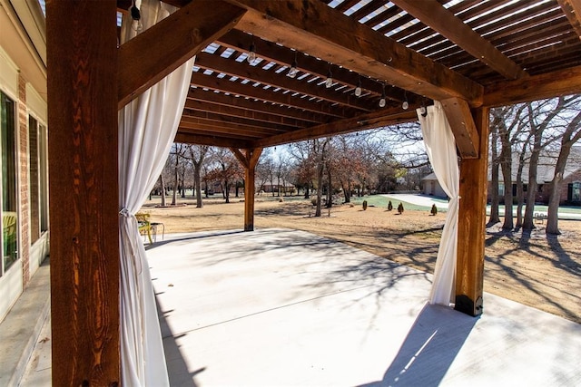 view of patio / terrace featuring a pergola