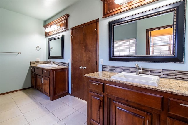 bathroom with vanity and tile patterned floors