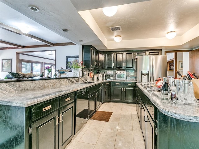 kitchen with light tile patterned flooring, light stone counters, stainless steel fridge with ice dispenser, dishwasher, and beam ceiling