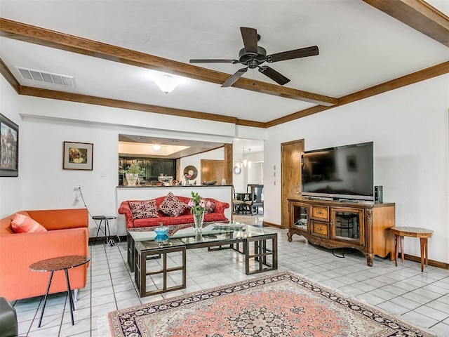 tiled living room featuring ceiling fan with notable chandelier