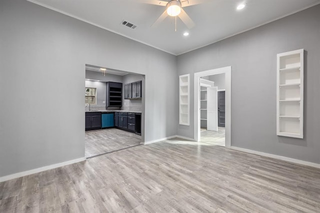 unfurnished living room with light hardwood / wood-style floors and ceiling fan