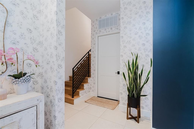 foyer with light tile patterned floors