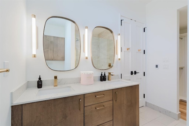 bathroom featuring vanity and tile patterned flooring