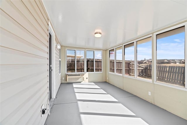 unfurnished sunroom featuring plenty of natural light