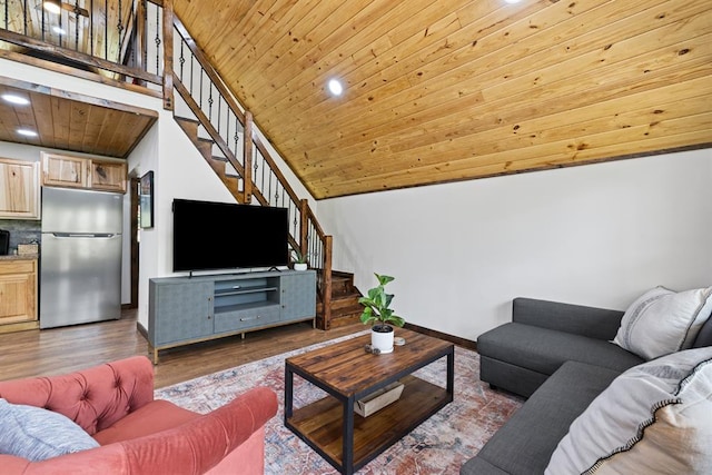 living room featuring dark hardwood / wood-style flooring, wood ceiling, and lofted ceiling