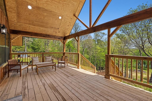 wooden deck featuring an outdoor living space