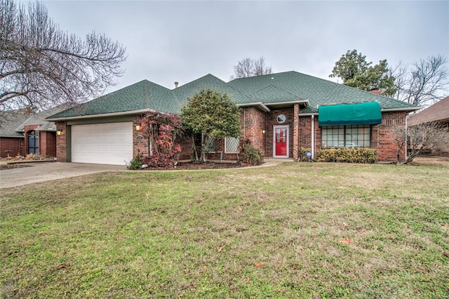 ranch-style house with a garage and a front yard