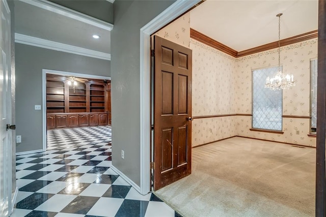 hallway with a notable chandelier and ornamental molding