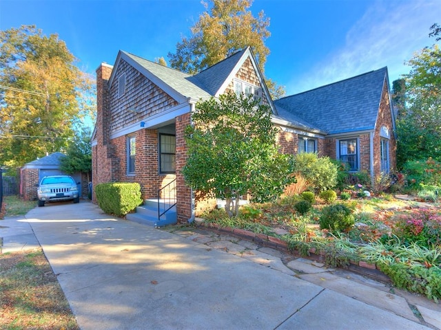 view of home's exterior featuring a garage and an outdoor structure