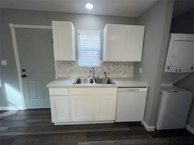 kitchen with white cabinetry, sink, backsplash, and white dishwasher