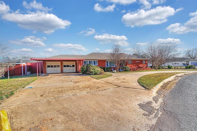 ranch-style house featuring a garage