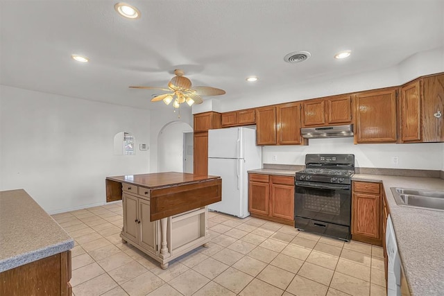 kitchen with ceiling fan, sink, light tile patterned floors, and white appliances