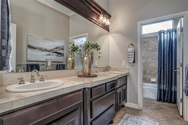 bathroom featuring ornamental molding, vanity, tile patterned flooring, and shower / tub combo