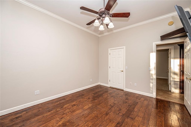 unfurnished bedroom featuring dark wood-type flooring, ceiling fan, and crown molding