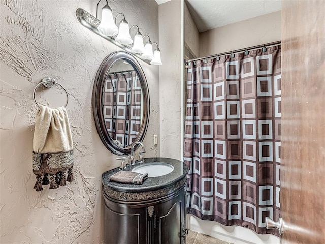 bathroom with vanity and a shower with curtain