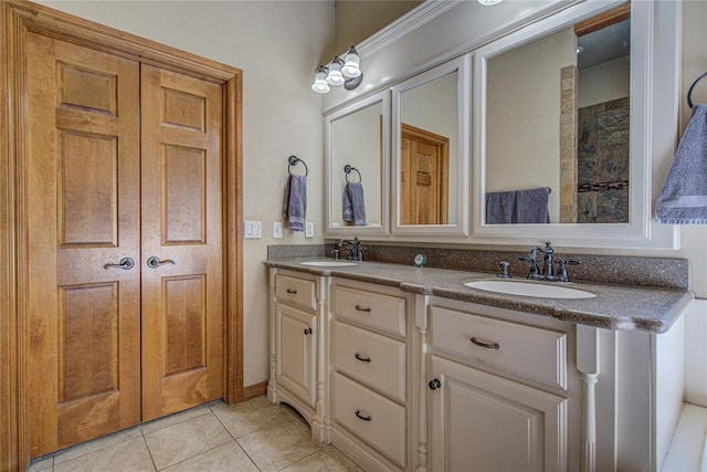 bathroom featuring vanity and tile patterned floors