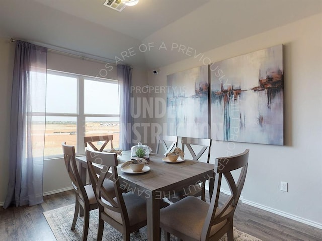 dining room featuring dark hardwood / wood-style flooring