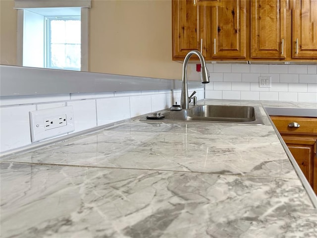 kitchen with sink and backsplash