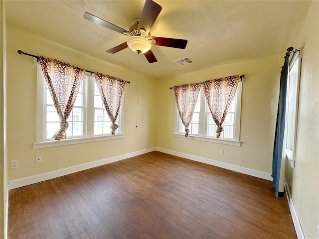 empty room with wood-type flooring and ceiling fan