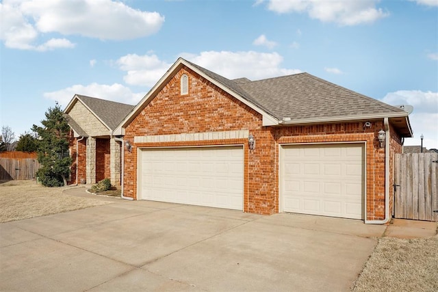 ranch-style house featuring a garage