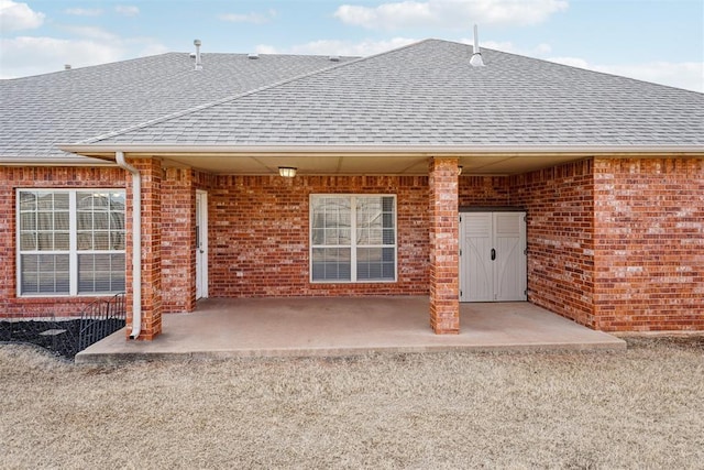 back of house with a patio area