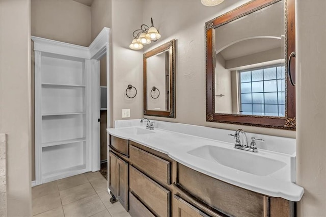 bathroom with tile patterned flooring and vanity