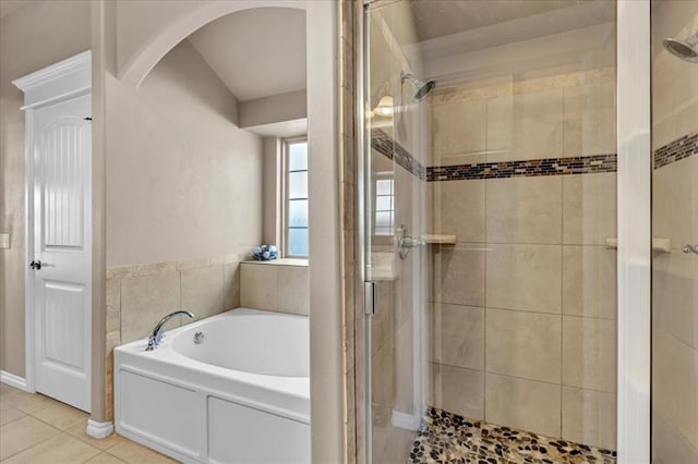 bathroom featuring separate shower and tub and tile patterned floors