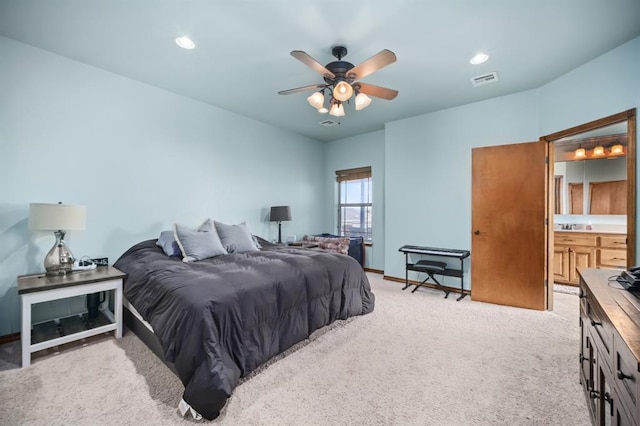 bedroom featuring ceiling fan and light carpet