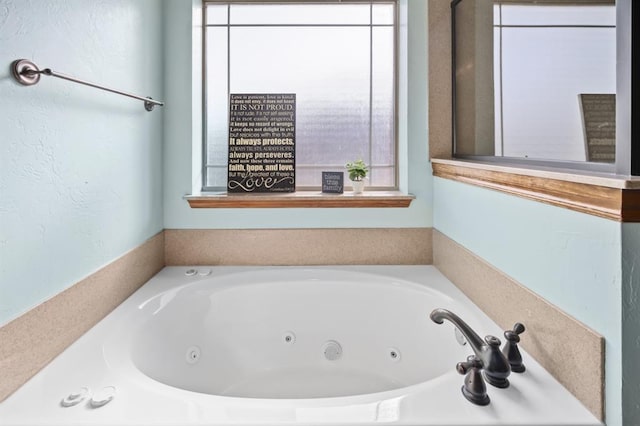 bathroom with a bathing tub