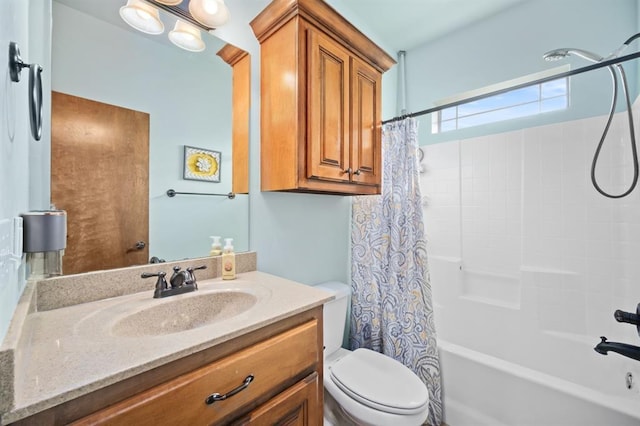 full bathroom featuring vanity, toilet, and shower / bathtub combination with curtain