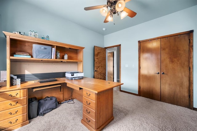 office space featuring light colored carpet and ceiling fan