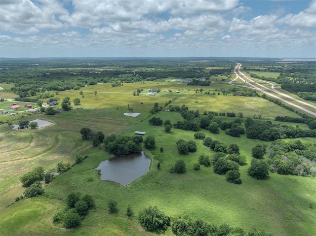 414315 E 1080th Rd, Checotah, OK 74426 - aerial view of property and surrounding area with a nearby body of water and rural landscape