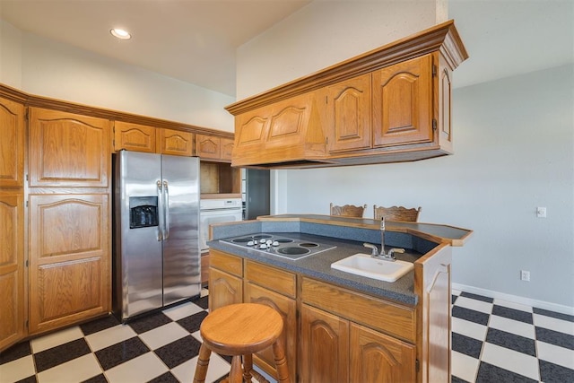 414315 E 1080th Rd, Checotah, OK 74426 - kitchen featuring stainless steel refrigerator with ice dispenser, light flooring, electric stovetop, dark countertops, and brown cabinetry