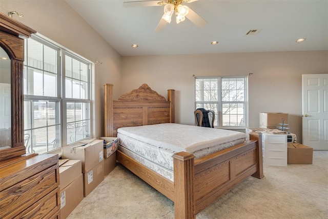 414315 E 1080th Rd, Checotah, OK 74426 - bedroom with light carpet, a ceiling fan, and recessed lighting