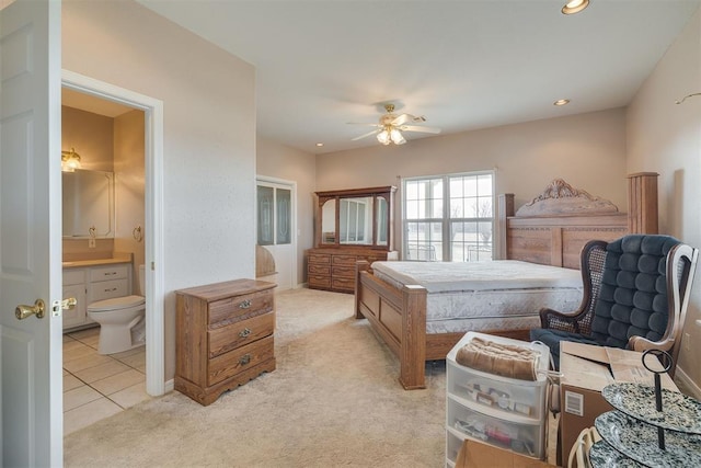 414315 E 1080th Rd, Checotah, OK 74426 - bedroom featuring light carpet, ensuite bath, recessed lighting, and ceiling fan