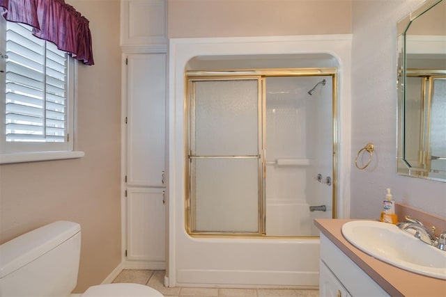 414315 E 1080th Rd, Checotah, OK 74426 - full bathroom with vanity, bath / shower combo with glass door, and tile patterned flooring