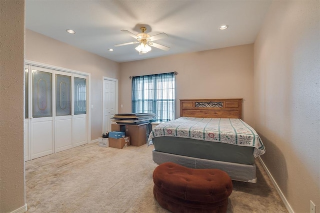 414315 E 1080th Rd, Checotah, OK 74426 - carpeted bedroom featuring ceiling fan and two closets