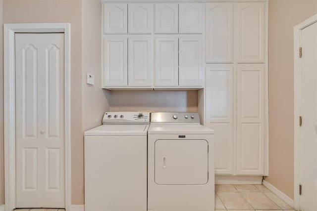 414315 E 1080th Rd, Checotah, OK 74426 - washroom with cabinet space, separate washer and dryer, and light tile patterned flooring