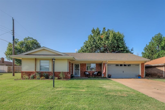 single story home featuring a garage and a front yard