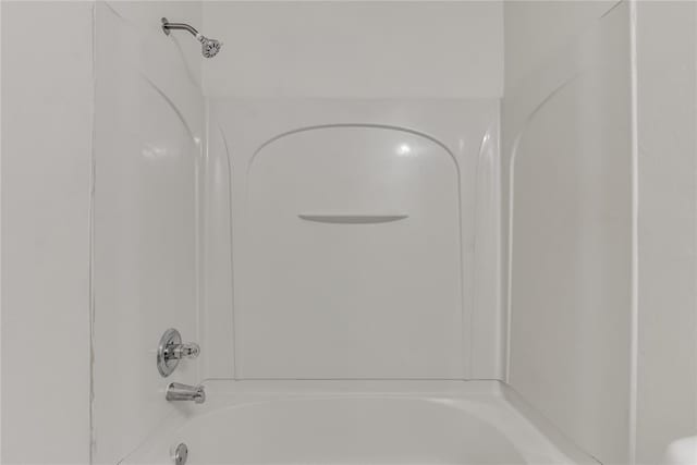 bathroom with shower / bath combination