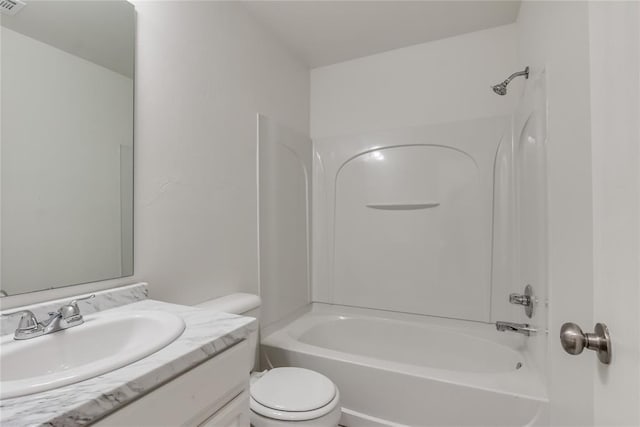 full bathroom featuring shower / bath combination, vanity, and toilet