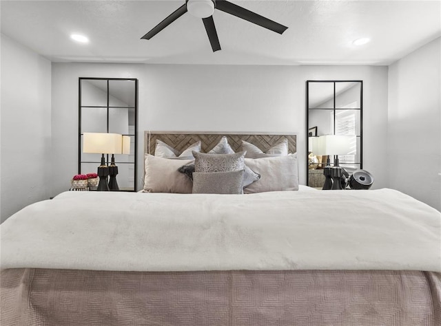 bedroom with a ceiling fan and recessed lighting