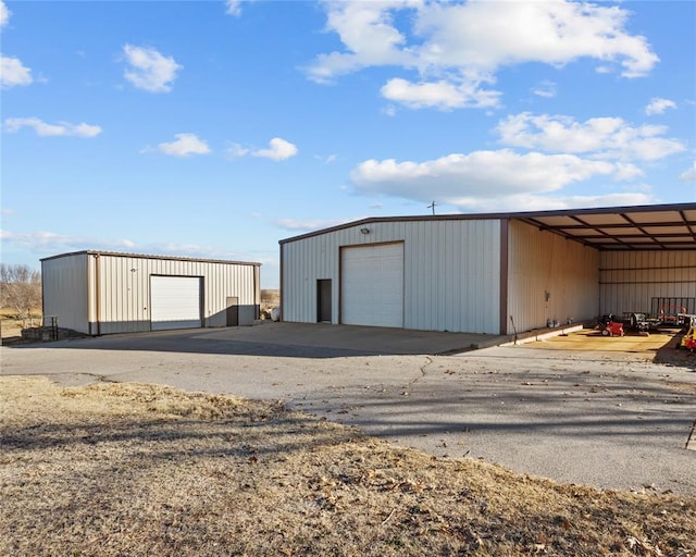 view of outbuilding with an outbuilding