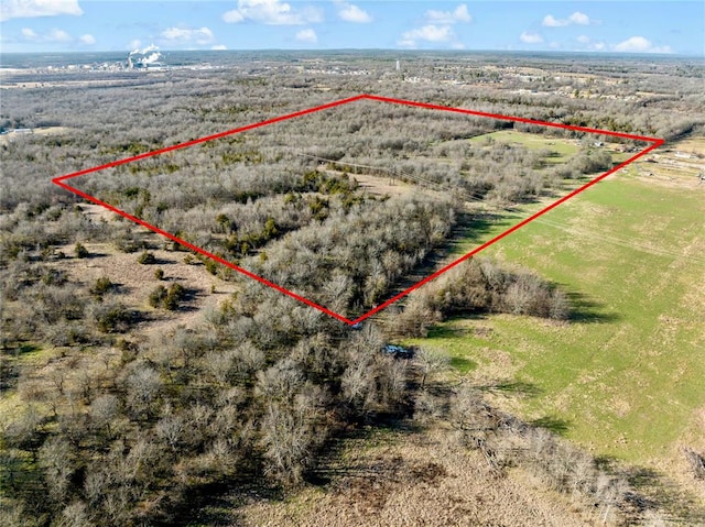 birds eye view of property featuring a rural view