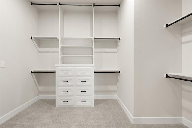 4341 Courtlyn Ave, Tuttle, OK 73089 - walk in closet featuring light colored carpet