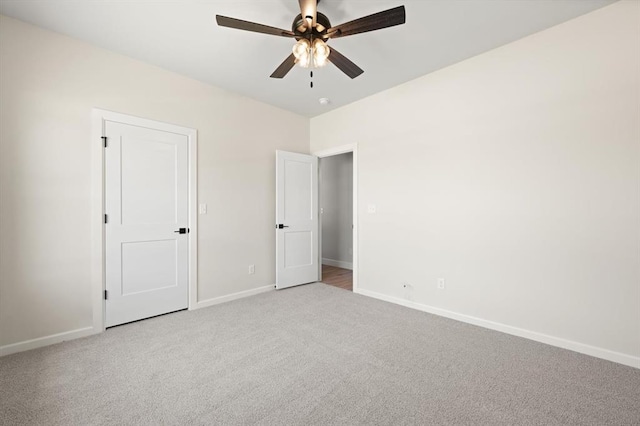 4341 Courtlyn Ave, Tuttle, OK 73089 - unfurnished bedroom featuring carpet flooring, baseboards, and ceiling fan