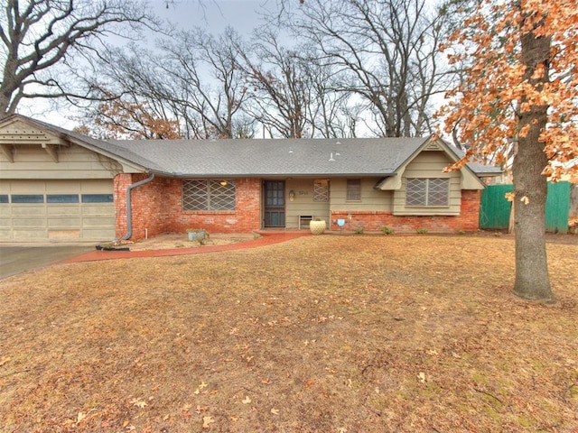 ranch-style home with a garage